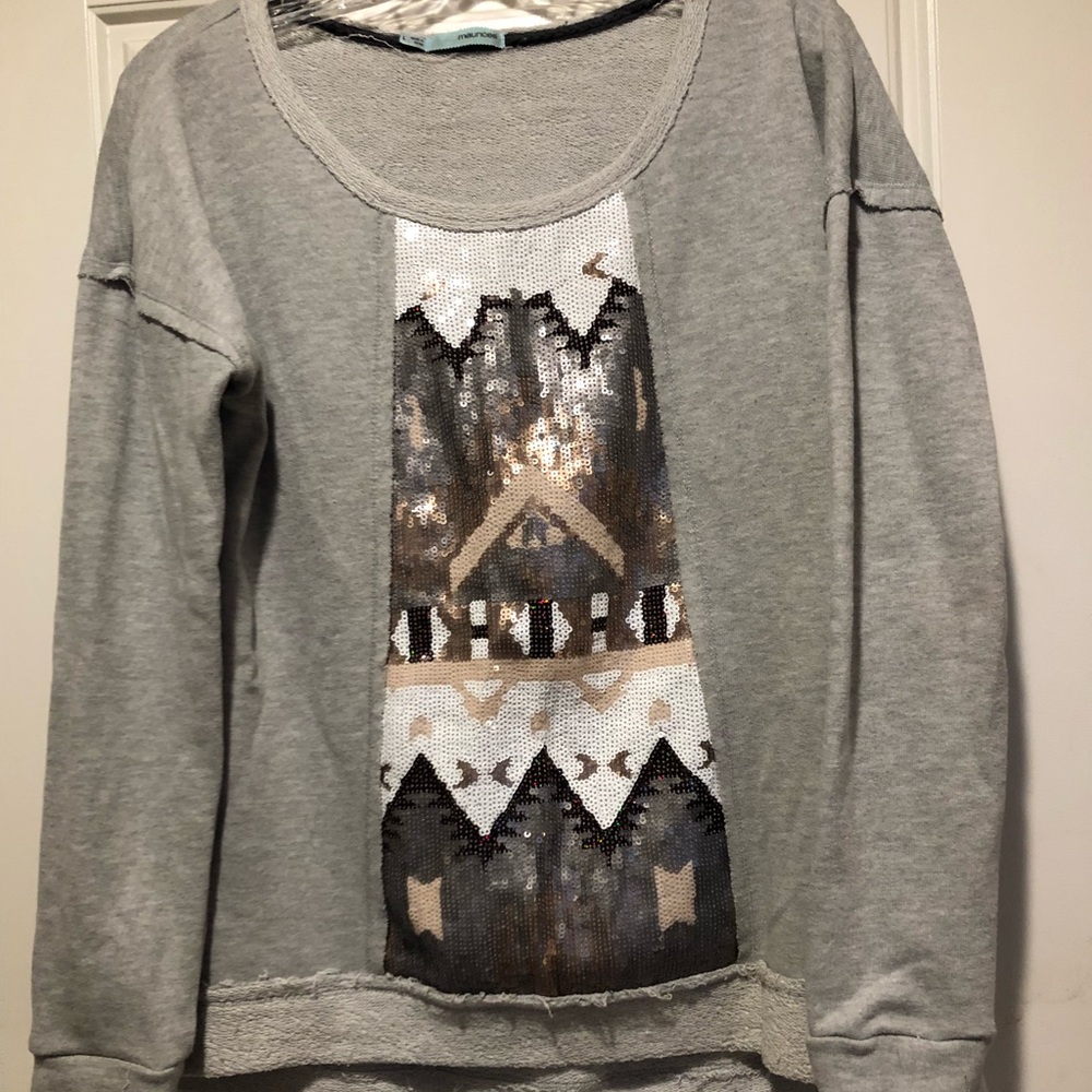 Maurice’s sweatshirt